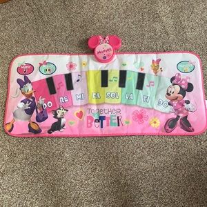 Never been used Minnie floor piano